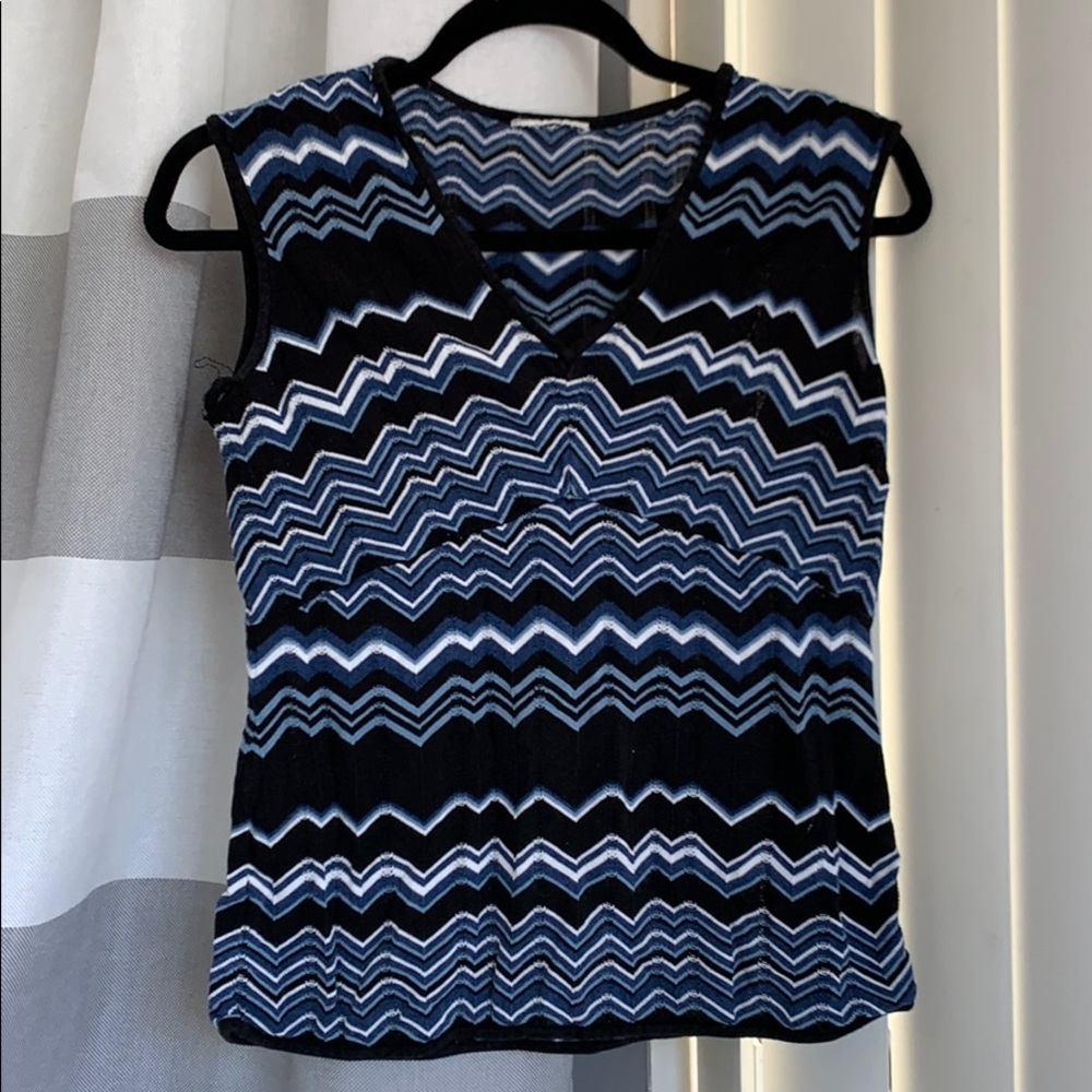 Blue black and white peplum knit blouse